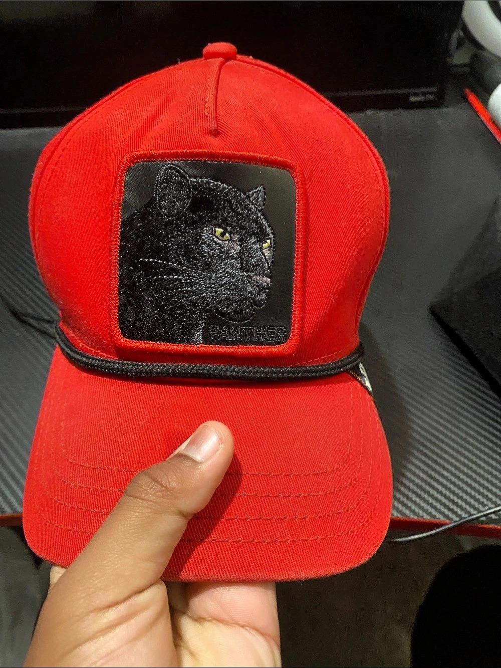 The Farm Going Bros. Panther patch trucker hat. in Red